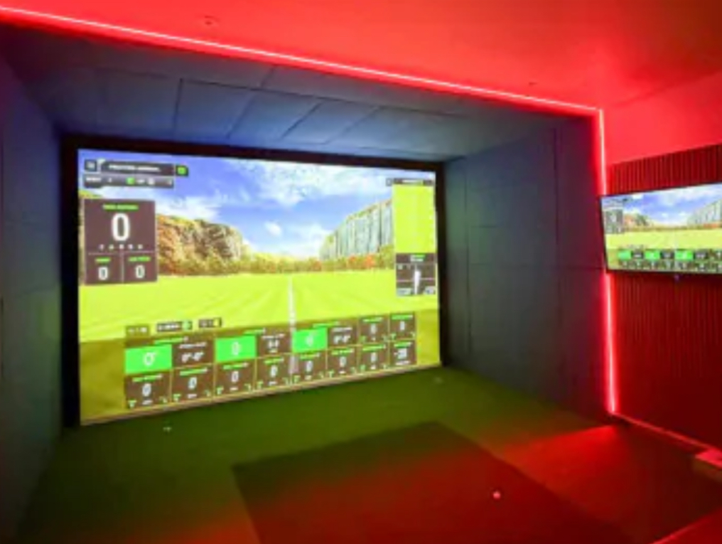 Custom LED lighting installed in luxury golf simulator room.