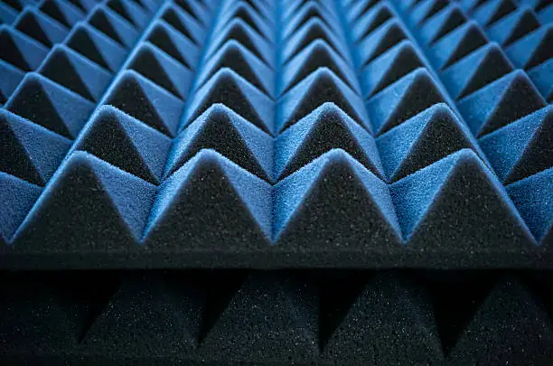 Acoustic wall panels and golf curtains for soundproof indoor simulator.