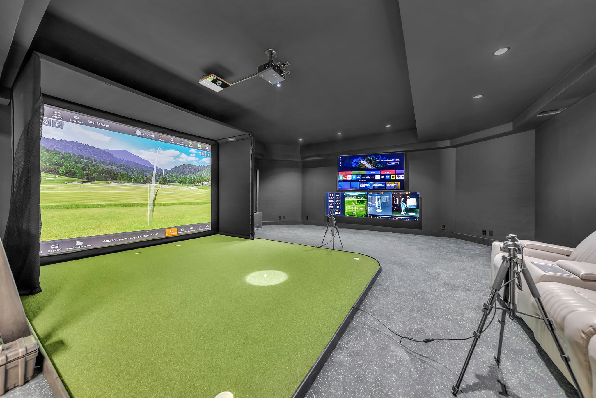 Luxury Golf Simulator Setup in a premium room.